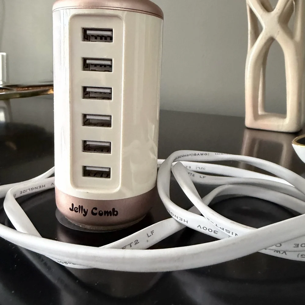White and Gold USB Charger Tower. Works perfect and in excellent condition.